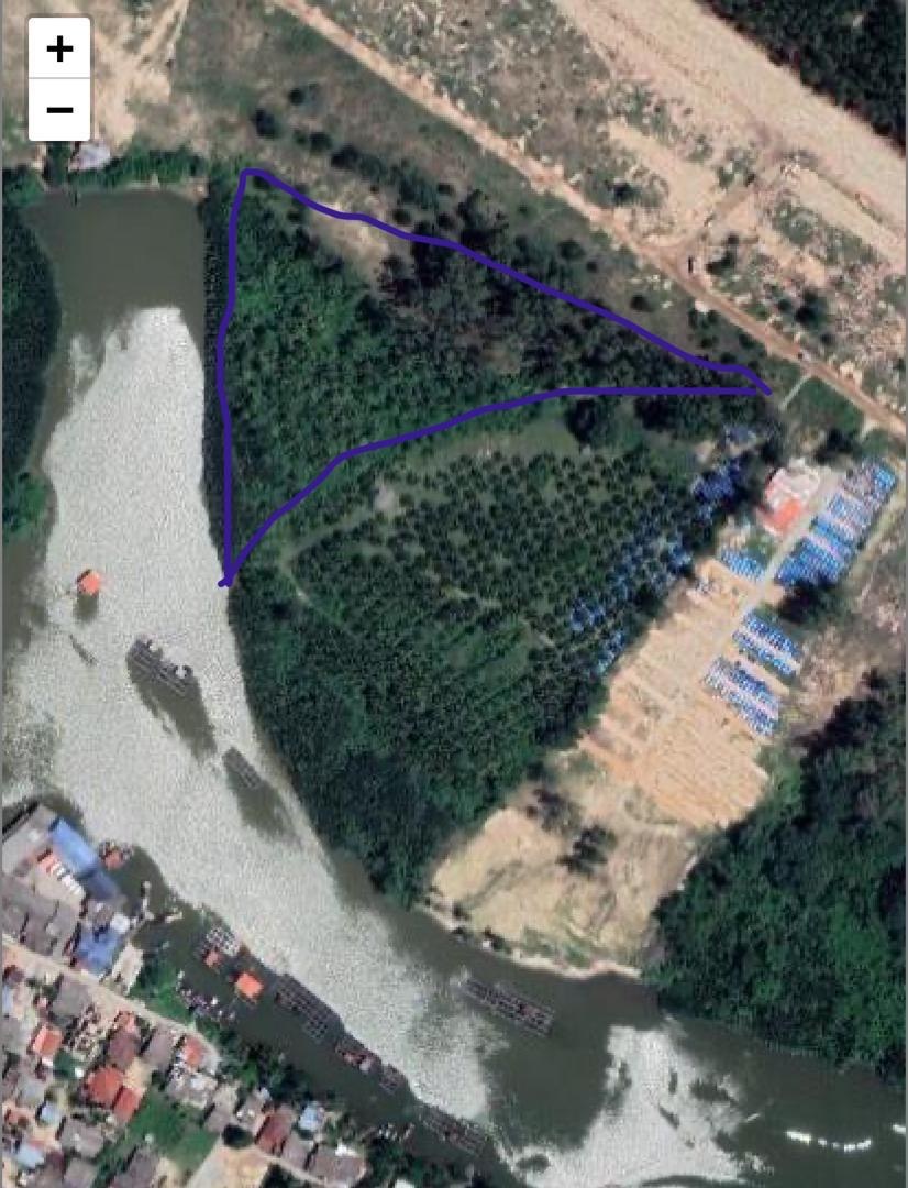 Aerial screenshot with an indicative outline for the approximately six-acre parcel